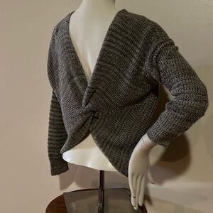 Absolutely creative worldwide sweater partial open back detail